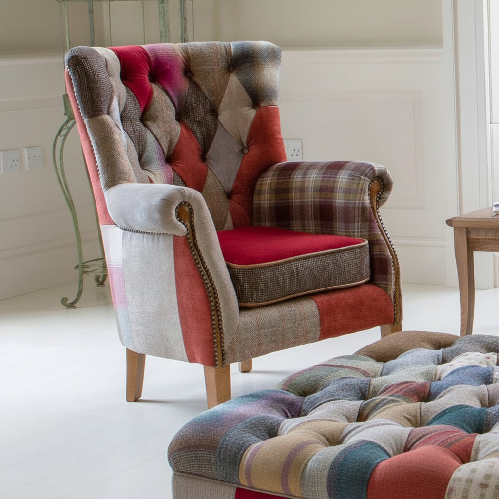 Vintage Sofa Company Barnard Patchwork Chair features a mix of fabrics with deep button tufting to the backrest, scrolled arms with brass stud details and wooden legs