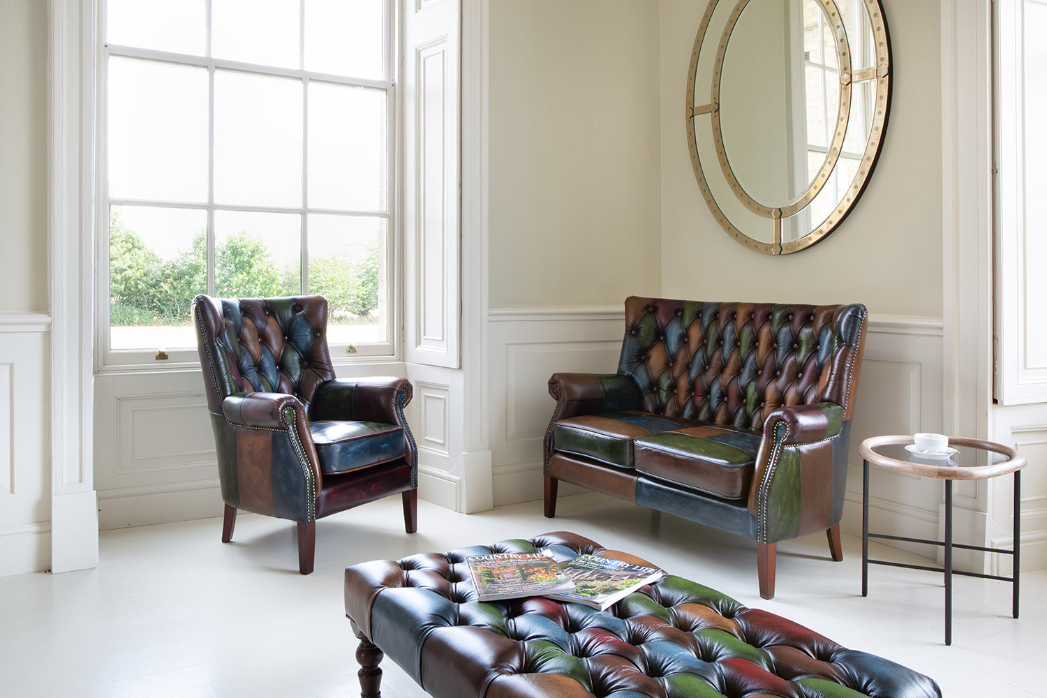 Vintage Sofa Company Bowes Rub-Off Leather Patchwork 2 Seater Sofa with high back design, deep button tufting and brass stud detailing. Co-ordinating pieces are also available