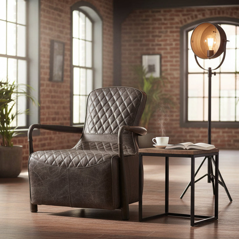 The Vintage Sofa Company's Broadway Snug Chair features premium leather upholstery with diamond quilting design in a rich dark brown, with distinctive black metal frame