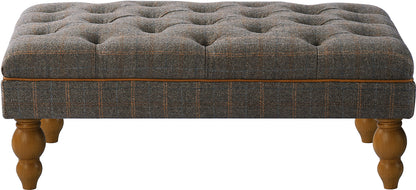 Vintage Sofa Company Buttoned Footstool Upholstered in a Grey Toned, Fellwood Lodge Harrington Tweed with button top , leather piping and turned wooden legs