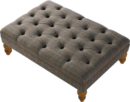 Vintage Sofa Company Buttoned Footstool in Fellwood Lodge Harrington Tweed with deep button tufting, tan leather piping and turned wooden legs