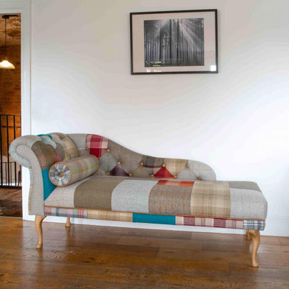 Vintage Sofa Company Chester Chaise Sofa in Patchwork upholstery, with matching bolster cushion, button tufting to the backrest, one scrolled arm and wooden legs