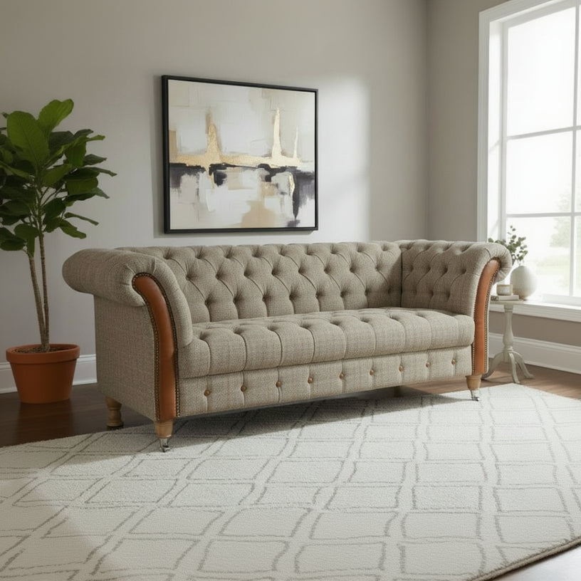 Vintage Sofa Company Chester Lodge 2 Seat Sofa in Hunting Lodge Harris Tweed Fabric with tan leather arm panels, deep buttoning and turned wooden feet with front castors