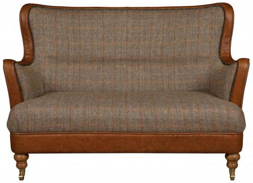 Vintage Sofa Company Ellis 2 Seat Sofa in Hunting Lodge Harris Tweed Fabric with tan leather trim, brass stud detailing and turned wooden legs with front castors