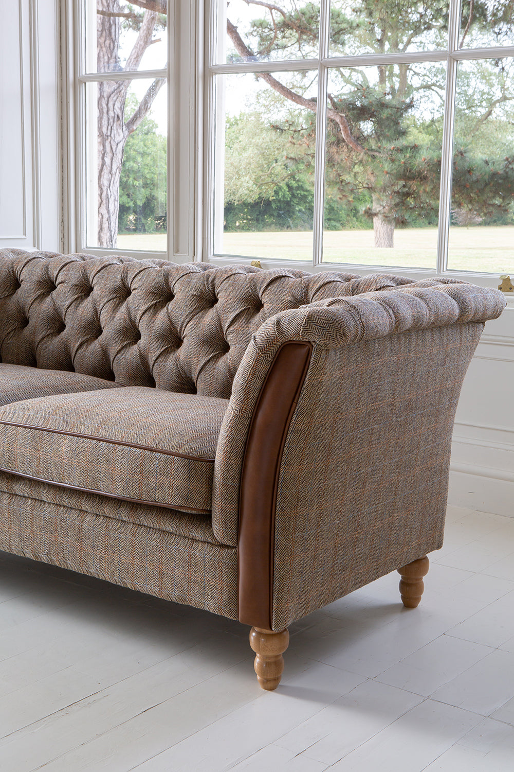 Vintage Sofa Company Granby 2 Seater Sofa in Hunting Lodge fabric with leather trim to the cushions and arm panels