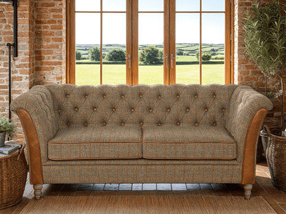Vintage Sofa Company Granby 2 Seater Sofa in Hunting Lodge fabric with deep button tufting to the back and arms, tan leather trim to the arm panels and seat cushions, and turned wooden feet