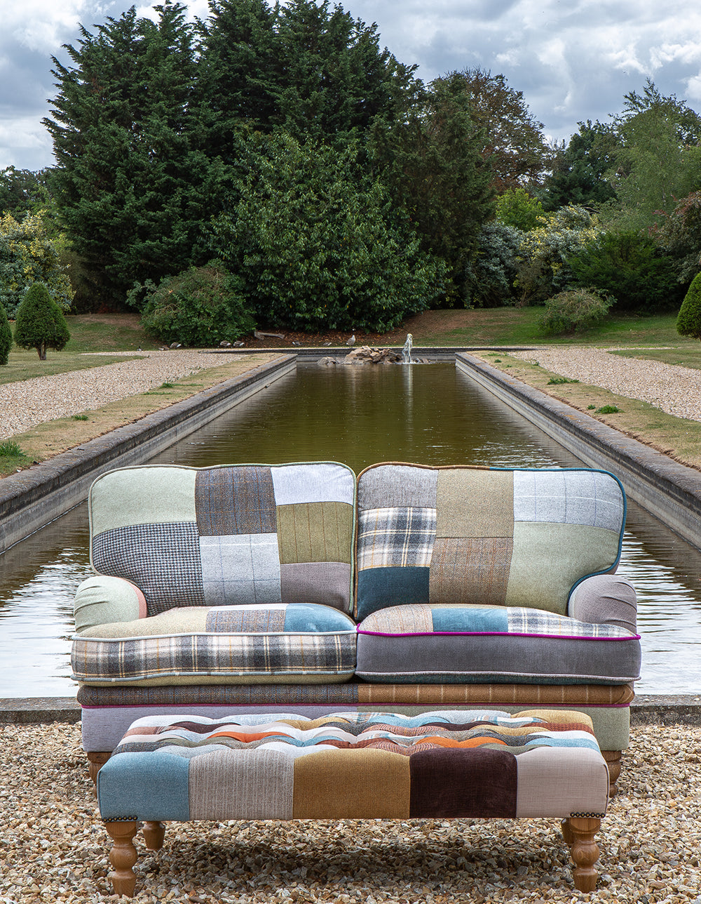 Vintage Sofa Company Hawksworth Patchwork 2.5 Seater Sofa with plush cushions, rounded armrests and turned wooden legs. Co-ordinating pieces are also available