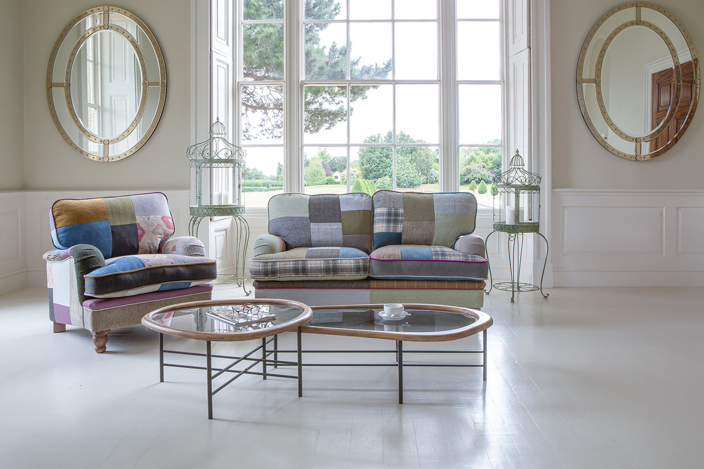 Vintage Sofa Company Hawksworth Patchwork 2.5 Seater Sofa upholstered with a mix of tartans, velvets, checks and tweeds, with rolled arms and turned wood legs. Co-ordinating pieces are also available
