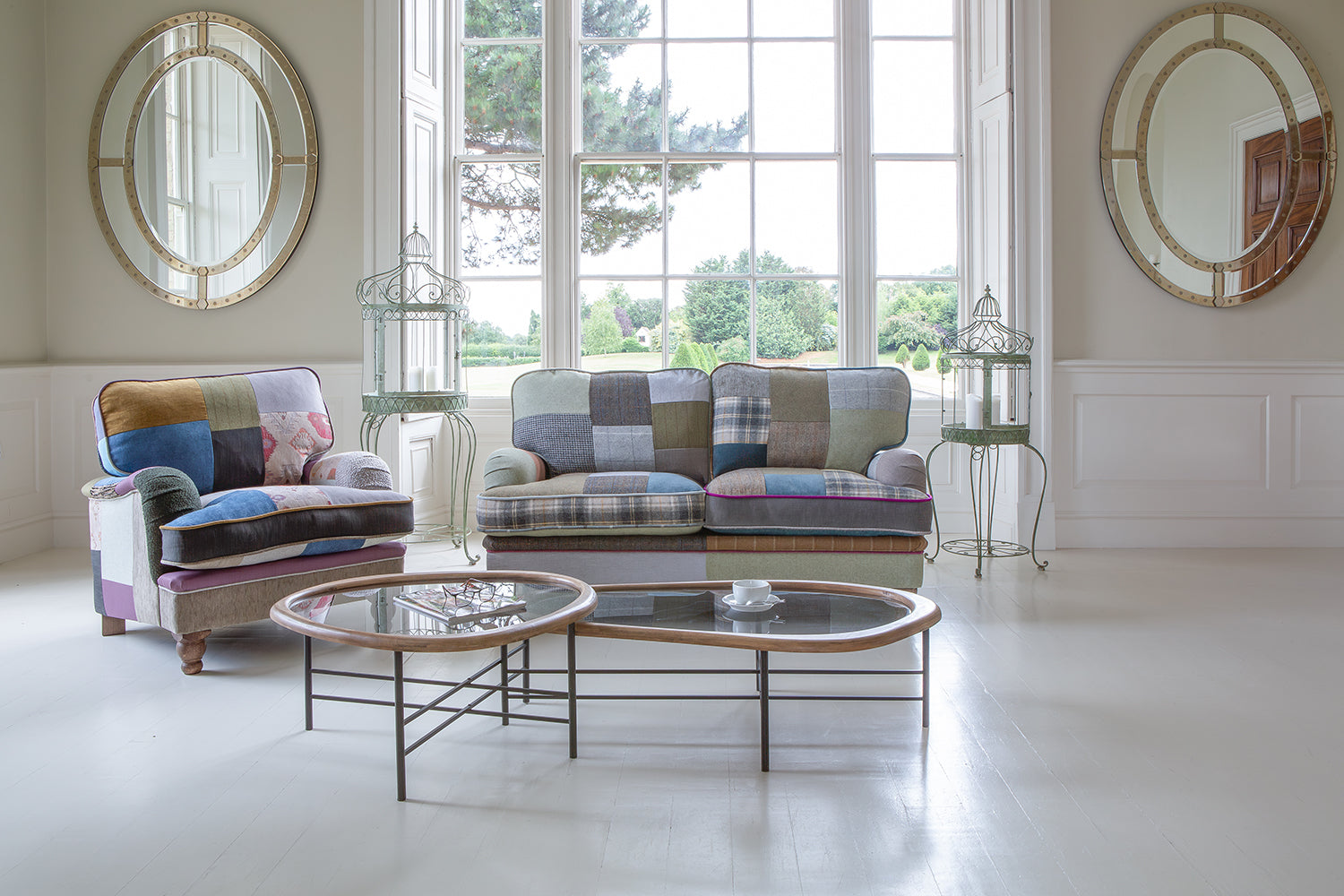 Vintage Sofa Company Hawksworth Patchwork 2.5 Seater Sofa upholstered with a mix of tartans, velvets, checks and tweeds, with rolled arms and turned wood legs. Co-ordinating pieces are also available