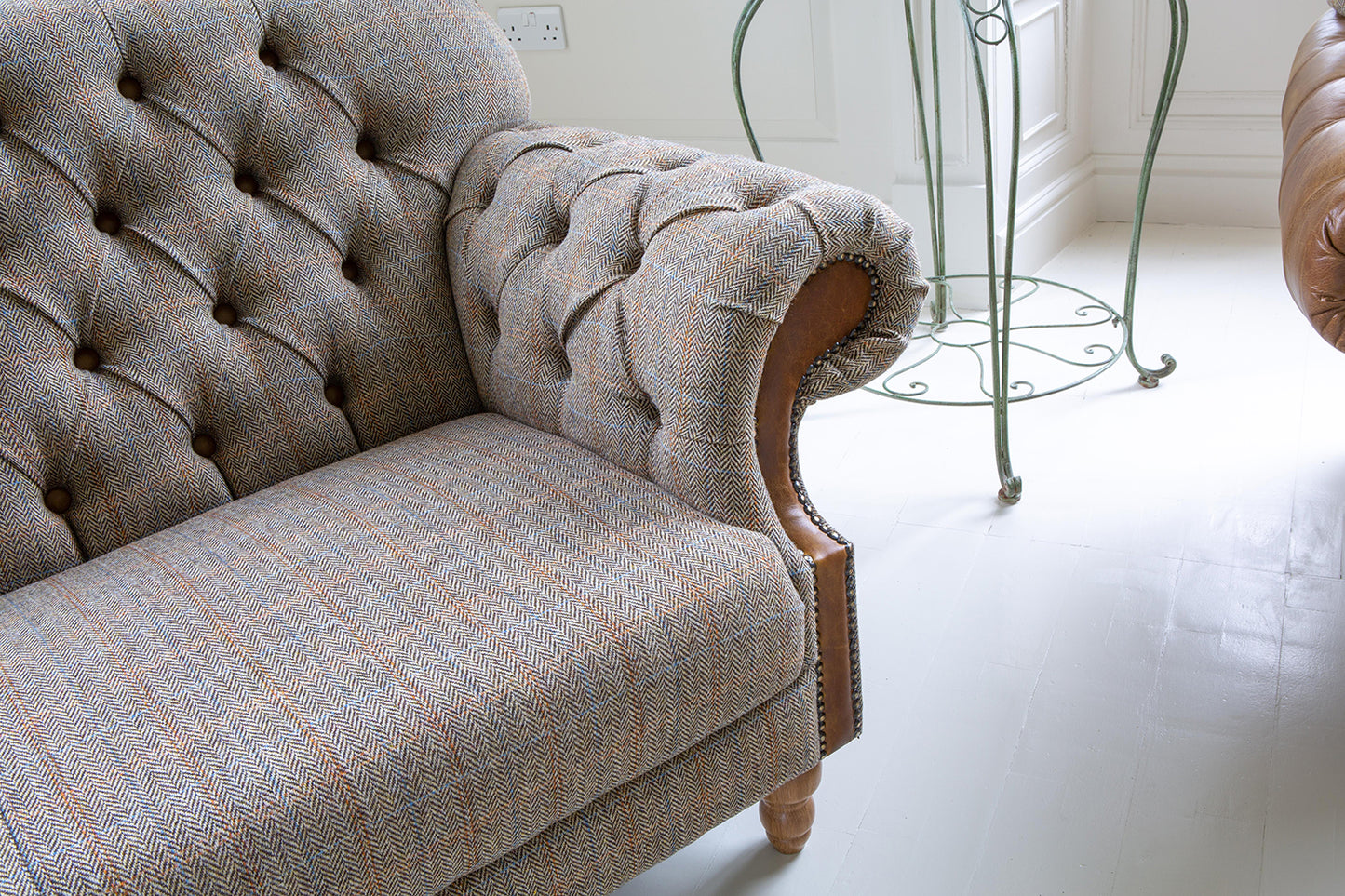 Vintage Sofa Company Haworth 3 Seater Sofa in Hunting Lodge tweed fabric with deep button tufting to the back and arms, with tan panels on the arm fronts and brass stud detailing
