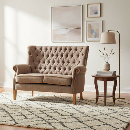 Vintage Sofa Company Hexham 2 Seat Sofa upholstered in Hunting Lodge Harris Tweed Fabric with deep button tufting and tan leather trim detail