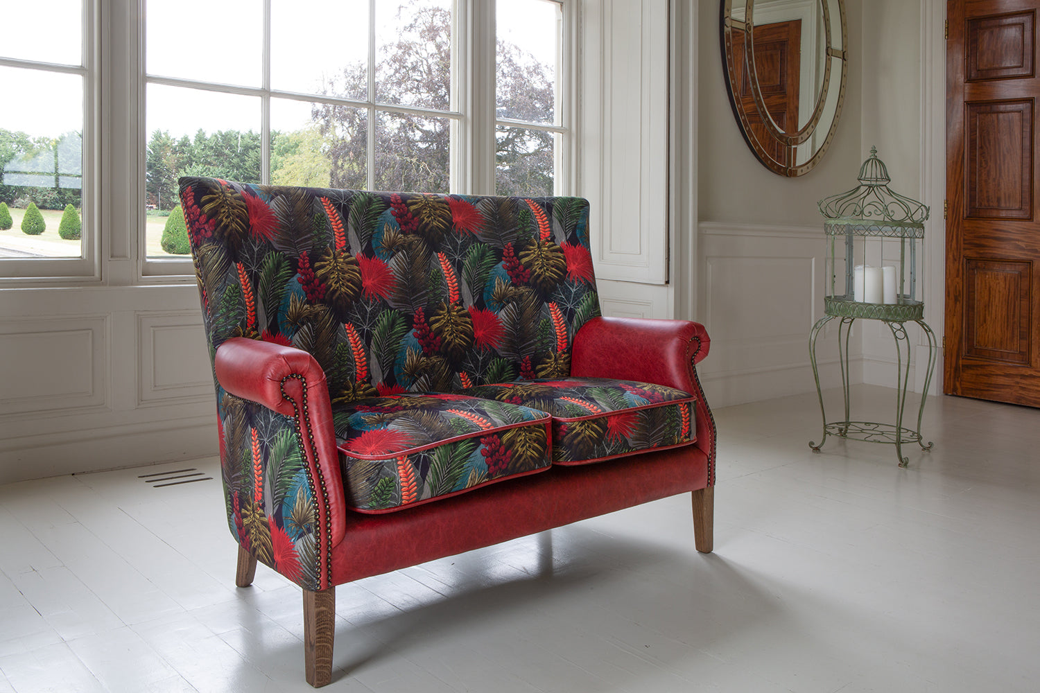 Vintage Sofa Company Hexham 2 Seater in Toucan Fabric and Rosso Leather upholstery with brass stud detailing and antique waxed legs