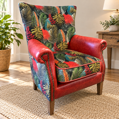 Vintage Sofa Company Hexham chair in Toucan fabric and Rosso red leather shown complete in a living room