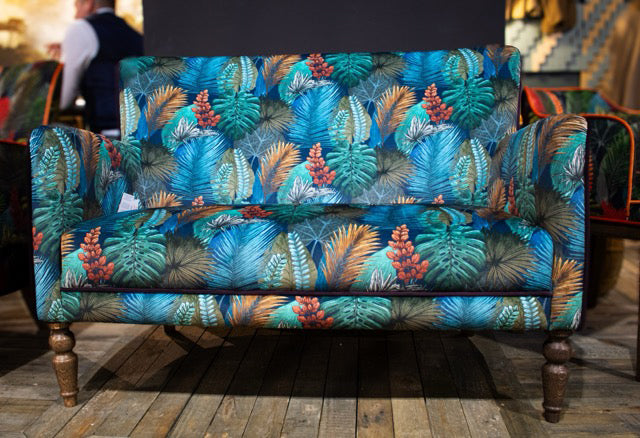 Vintage Sofa Company Howden Compact 2 Seater Sofa in Tropical Leaf Kingfisher upholstery, with turned wooden legs