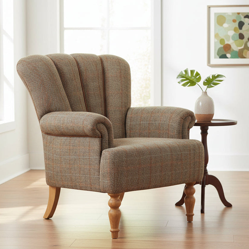 Vintage Sofa Company Lily Chair in Hunting Lodge Harris Tweed Fabric with a fluted backrest, tan leather piping and turned wooden legs