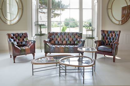 Vintage Sofa Company Litton Rub-Off Leather Patchwork 2 Seater Sofa with deep button tufting and shaped wooden feet