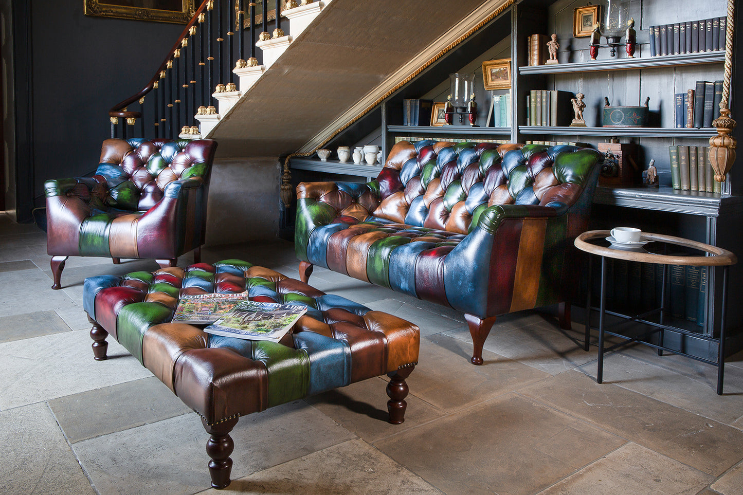 Vintage Sofa Company Rub-Off Leather Patchwork Armchair, part of the Litton Collection. Features deep button tufting, curved seat and shaped wooden legs