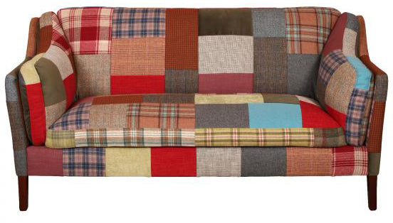 Vintage Sofa Company Malone 2 Seat Sofa upholstery in a contemporary Patchwork Fabric with slim cushioned arms, padded seat and back rest and dark wood tapered legs