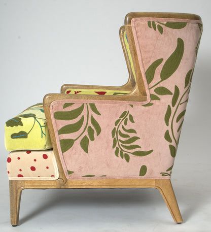 Vintage Sofa Company Morbi Chair features a mix of coloured fabrics and designs, from pinks, yellows and red polka dots, all within a solid wood frame with wingback design