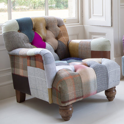 Vintage Sofa Company Morgan Accent Armchair in a mix of Leather and wool patchwork with buttoned detailing and chunky wooden legs