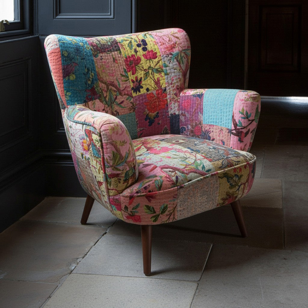 Vintage Sofa Company Patchwork Ravi Chair with floral patchwork quilt style fabrics in soft pinks, blues, yellows and greens, this compact armchair brings a lighter, more playful feel than a plain accent chair, with wingback shape and walnut-finish legs 