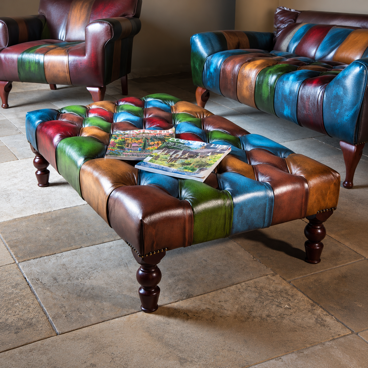 Vintage Sofa Company Rub Off Leather Patchwork Banquette Footstool shown complete in a square lifestyle room photograph