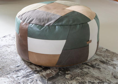 Vintage Sofa Company Soho Round Ottoman Patchwork Stool mixes leather and fabric in earthy tones, this generously sized stool works as a footrest, extra seat or relaxed accent piece