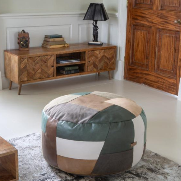 Vintage Sofa Company Soho Round Ottoman Stool in patchwork leather and fabric panels of charcoal, cream, tan and brown