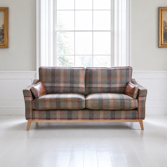 Vintage Sofa Company Whitwell 3 seater Sofa in Malham Green Wool & Tan Leather shown complete in a square lifestyle room photograph