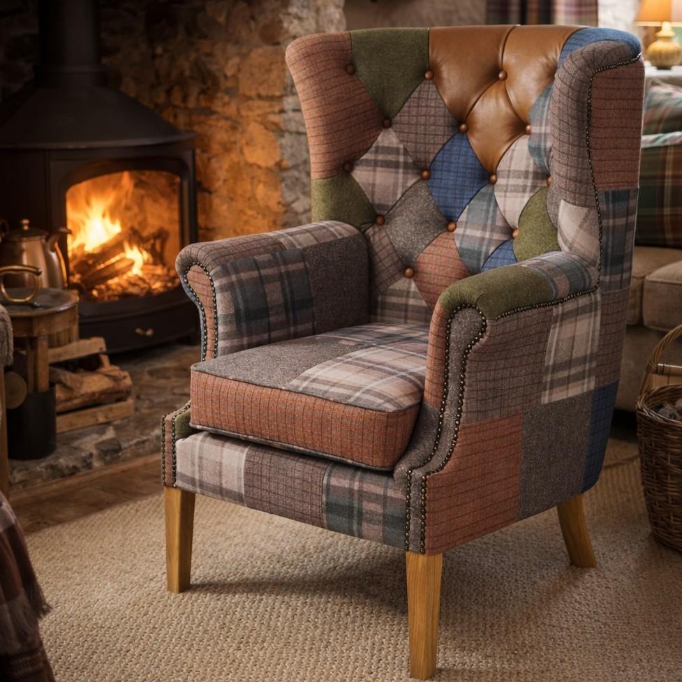Carlton Furniture Castleton Armchair in Patchwork with Natural Legs - warm room view of patchwork wing chair with studded arms