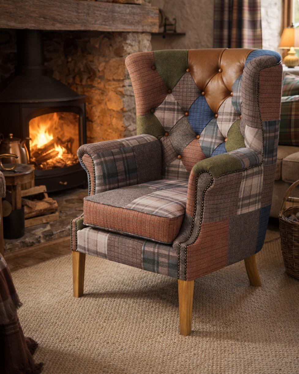 Carlton Furniture Castleton Armchair in Patchwork with Natural Legs - warm room view of patchwork wing chair with studded arms