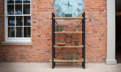 Carlton Furniture Fluted Line X-O Metal Bookcase - room view of wooden shelves and black metal frame against a brick wall