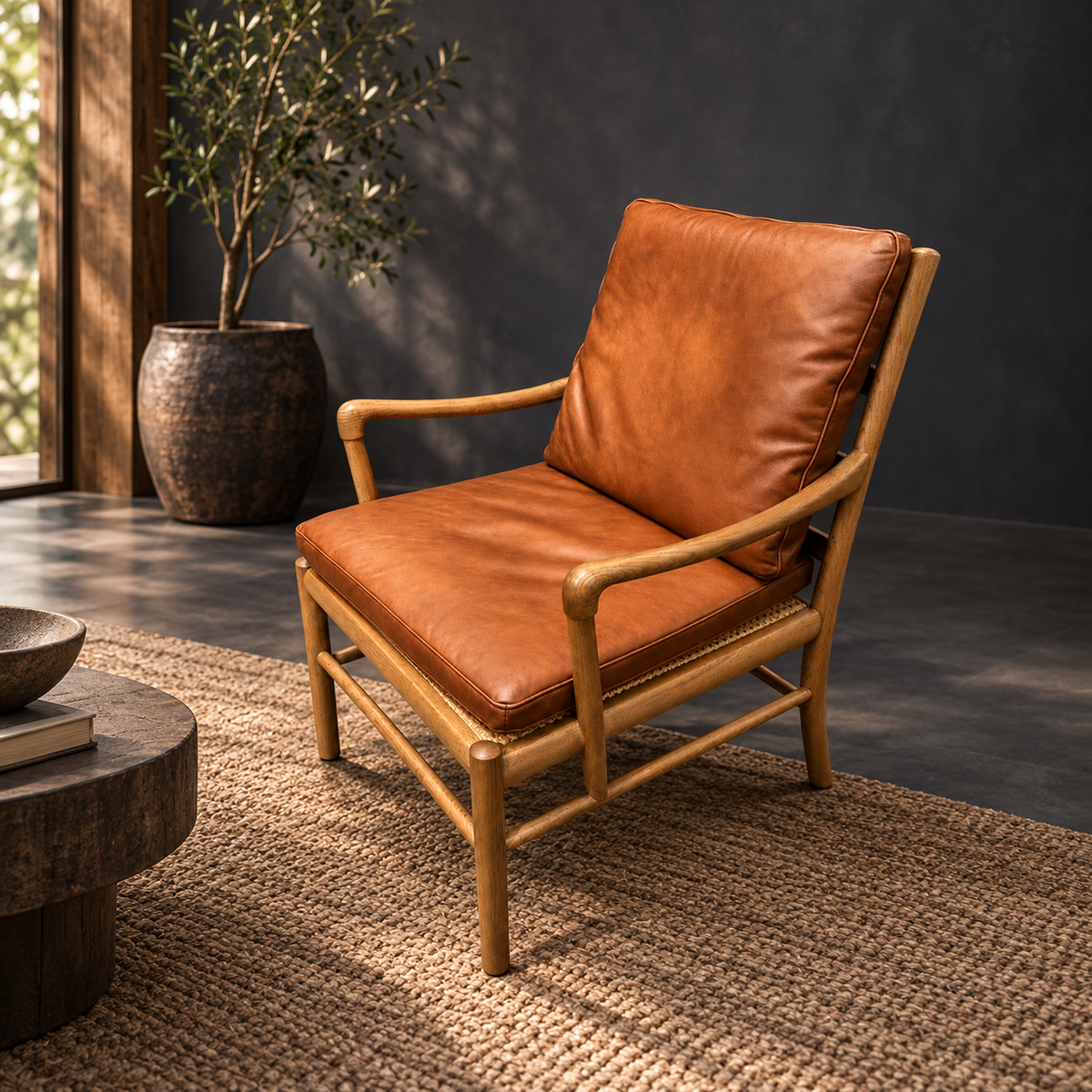 Carlton Furniture Hans Leisure Armchair in Vintage Rattan Havana Brown and Green Canvas shown in a room setting
