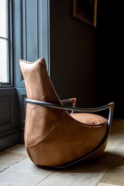 Carlton Furniture Maverick Retro Relax Armchair - side room view showing curved arms and tall brown back