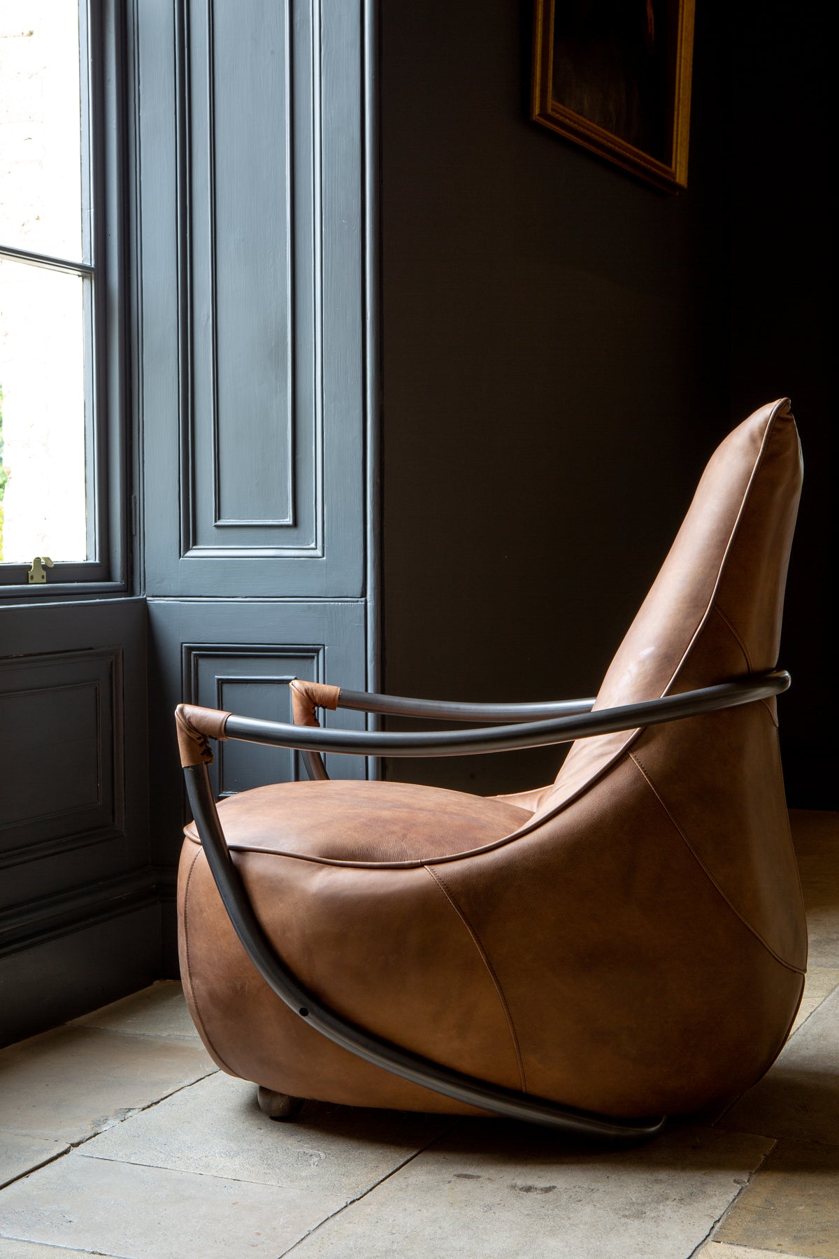 Carlton Furniture Maverick Retro Relax Armchair - side room view showing curved arms and tall brown back