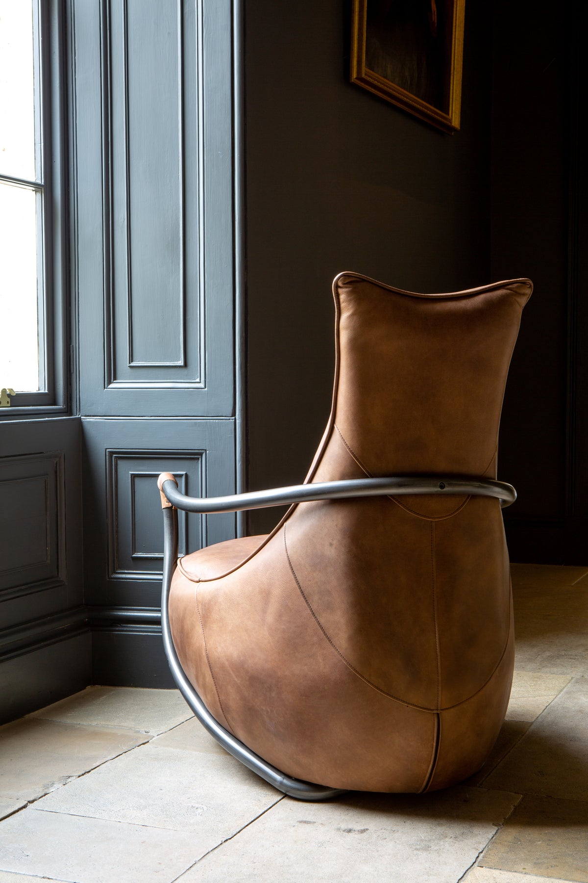 Carlton Furniture Maverick Retro Relax Armchair - side room view showing curved arms and tall brown back