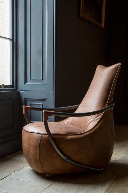 Carlton Furniture Maverick Retro Relax Armchair - side room view showing curved arms and tall brown back