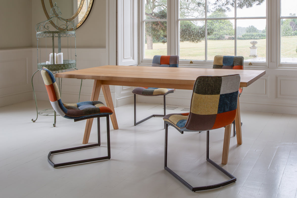 Carlton Furniture Modena Dining Table with A Shape Wooden Legs in Natural Oiled - room view of natural-oiled top and wooden A legs