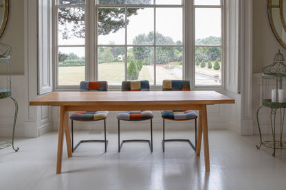 Carlton Furniture Modena Dining Table with A Shape Wooden Legs in Natural Oiled - room view of natural-oiled top and wooden A legs