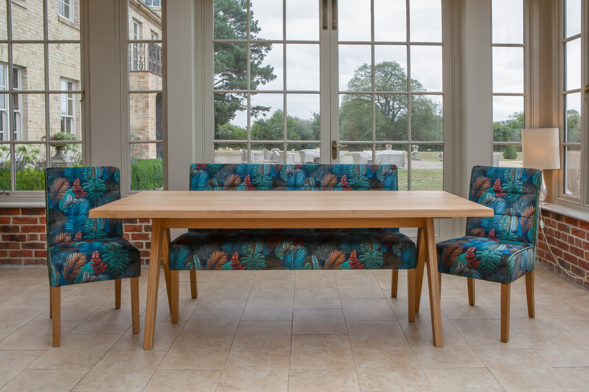 Carlton Furniture Modena Dining Table with A Shape Wooden Legs in Natural Oiled - room view of natural-oiled top and wooden A legs