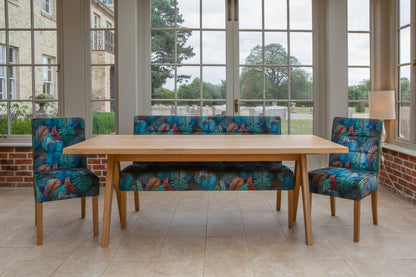 Carlton Furniture Modena Dining Table with A Shape Wooden Legs in Natural Oiled - room view of natural-oiled top and wooden A legs