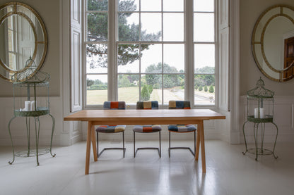 Carlton Furniture Modena Dining Table with A Shape Wooden Legs in Natural Oiled - room view of natural-oiled top and wooden A legs