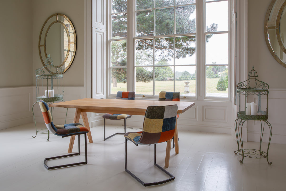 Carlton Furniture Modena Dining Table with A Shape Wooden Legs in Natural Oiled - room view of natural-oiled top and wooden A legs