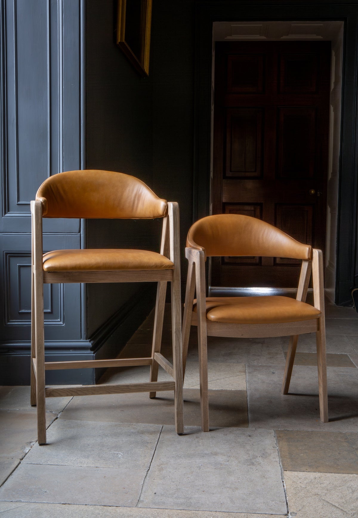 Carlton Furniture Ossby Barstool with Crossrail Tan Leather Grey Oiled Finish — lifestyle setting