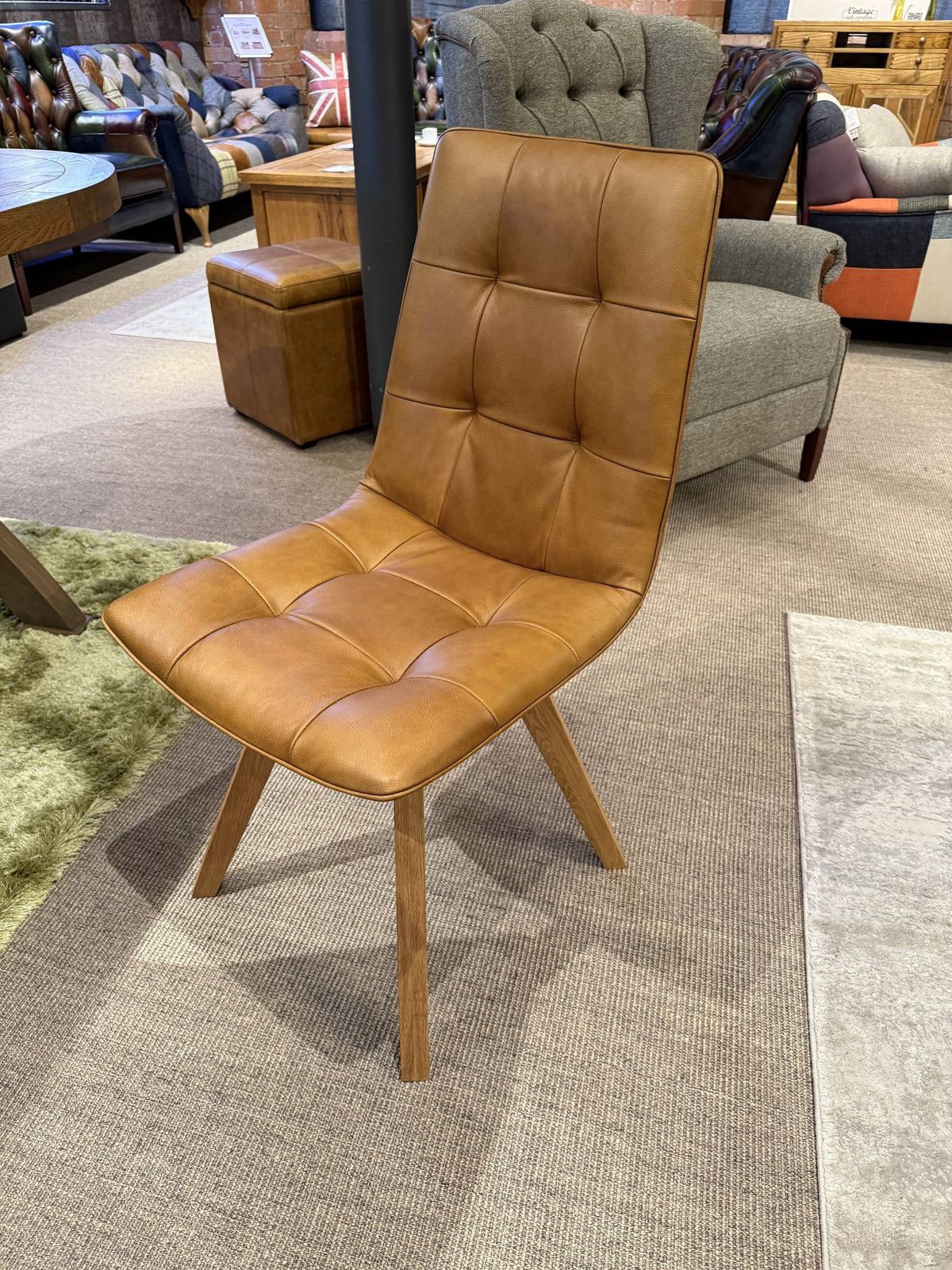 Carlton Furniture Pair of Atlanta Swivel Chairs - Tan Leather - Grey Oiled Legs — lifestyle setting