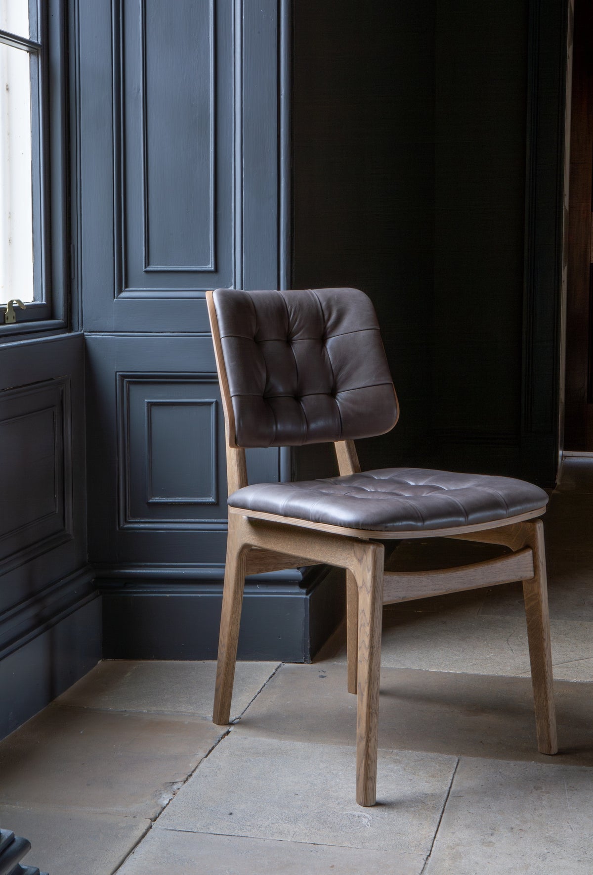 Carlton Furniture Pair of Boden Chairs upholstered seat and back in Grey Leather Grey oil legs — lifestyle setting