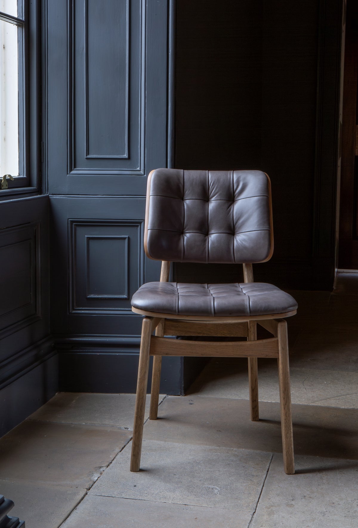 Carlton Furniture Pair of Boden Chairs upholstered seat and back in Grey Leather Grey oil legs — lifestyle setting