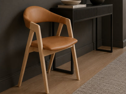 Carlton Furniture Pair of Ossby Chairs in Tan leather with Grey Oiled Legs — lifestyle setting