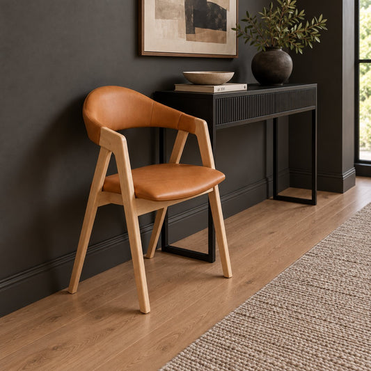 Carlton Furniture Pair of Ossby Chairs in Tan leather with Grey Oiled Legs — lifestyle setting