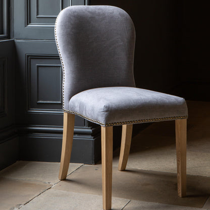 Carlton Furniture Pair of Pavilion Dining Chairs - Smoke with Grey oil legs & Brass Studs — lifestyle setting
